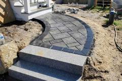 Walkway and granite steps to side entrance